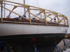 The frame is taking shape.  Many furring strips still needed to be fixed to the roof of the frame in order to support the tarp in a way that allowed water and snow to fall off.