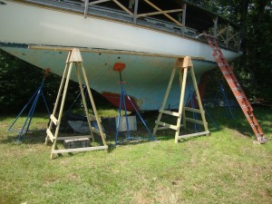 In the back yard. Note the scaffolding, from which work on the deck may be done.